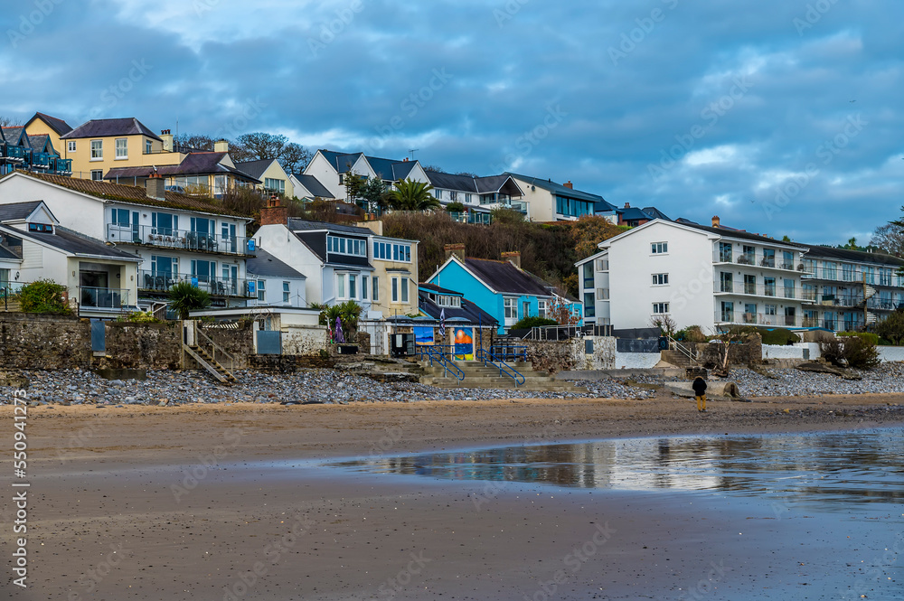 A view up the beach as the tide turns in Saundersfoot, Wales in winter