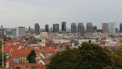 Canvas Print Cityscape of rural houses roofs and high skyscrapers in Bratislava, Slovakia