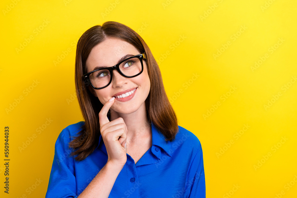 Closeup photo of young satisfied dreaming woman wear formal outfit with glasses finger chin minded look mockup isolated on yellow color background Closeup photo of young satisfied dreaming woman wear formal outfit with glasses finger chin minded look mockup isolated on yellow color background
