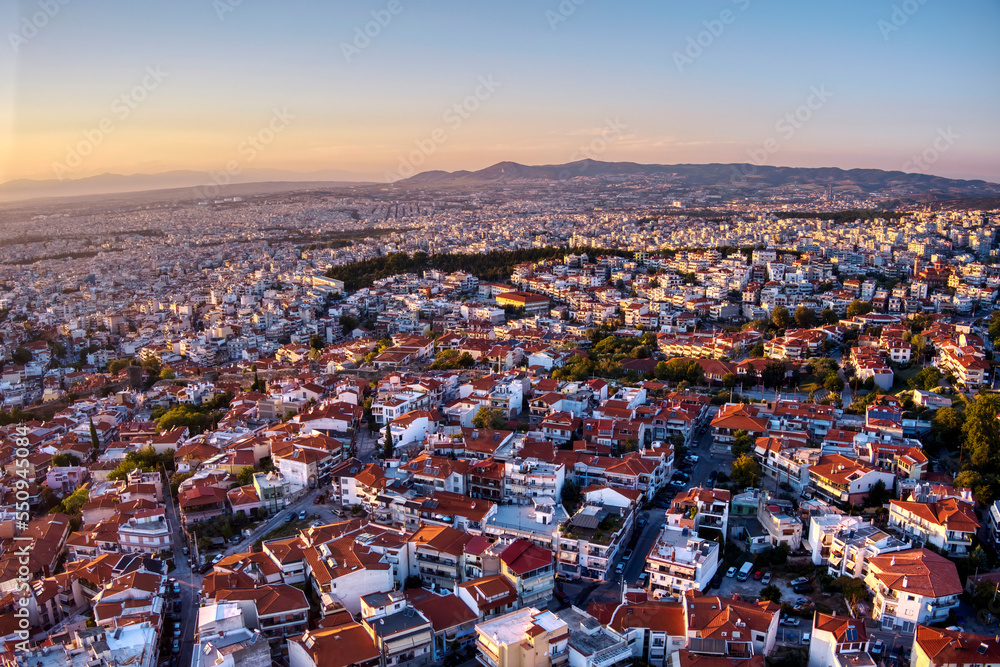 Aerial drone view of city of Thessaloniki at sunset, North Greece