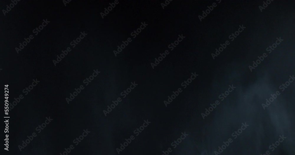 Spooky magic VFX Halloween. Atmospheric smoke VFX element in 4k Slow-motion. Haze background. Dust, smoke cloud. Smoke on black background. White smoke crawls and floats through space on black bg Spooky magic VFX Halloween. Atmospheric smoke VFX element in 4k Slow-motion. Haze background. Dust, smoke cloud. Smoke on black background. White smoke crawls and floats through space on black bg