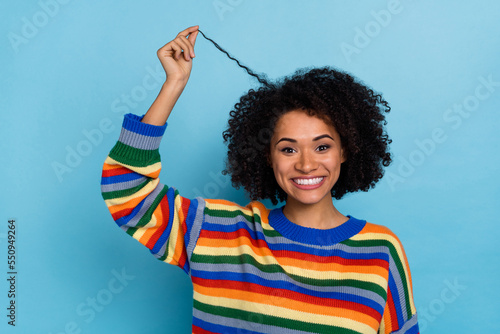 Bild auf Leinwand Photo of pretty wavy hairdo lady hold hair wear vivid sweater isolated on blue c