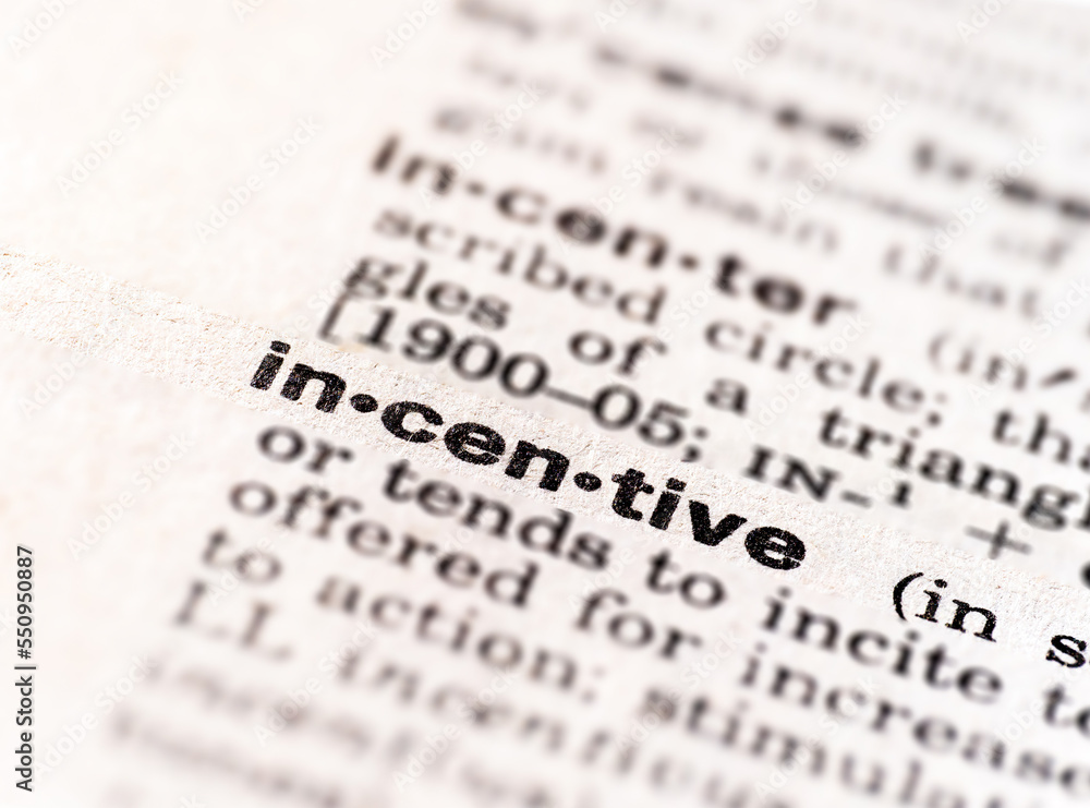 closeup of the word incentive dictionary definition closeup of the word incentive dictionary definition