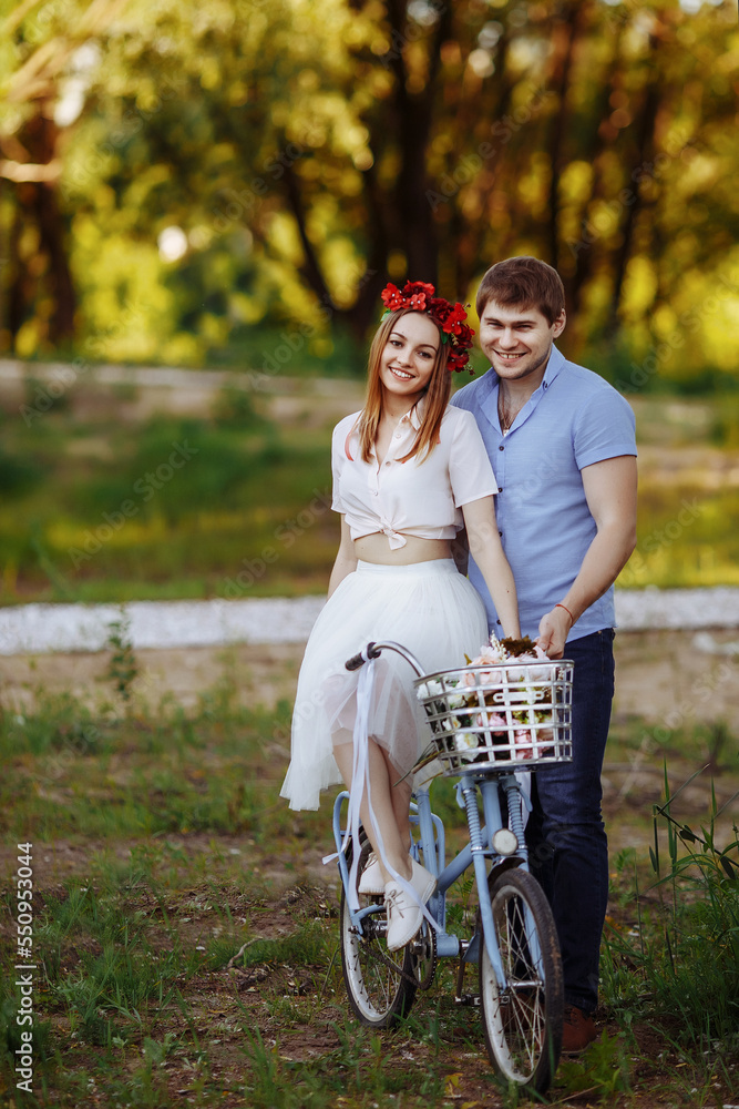 Fototapeta premium Loving couple on vintage bike