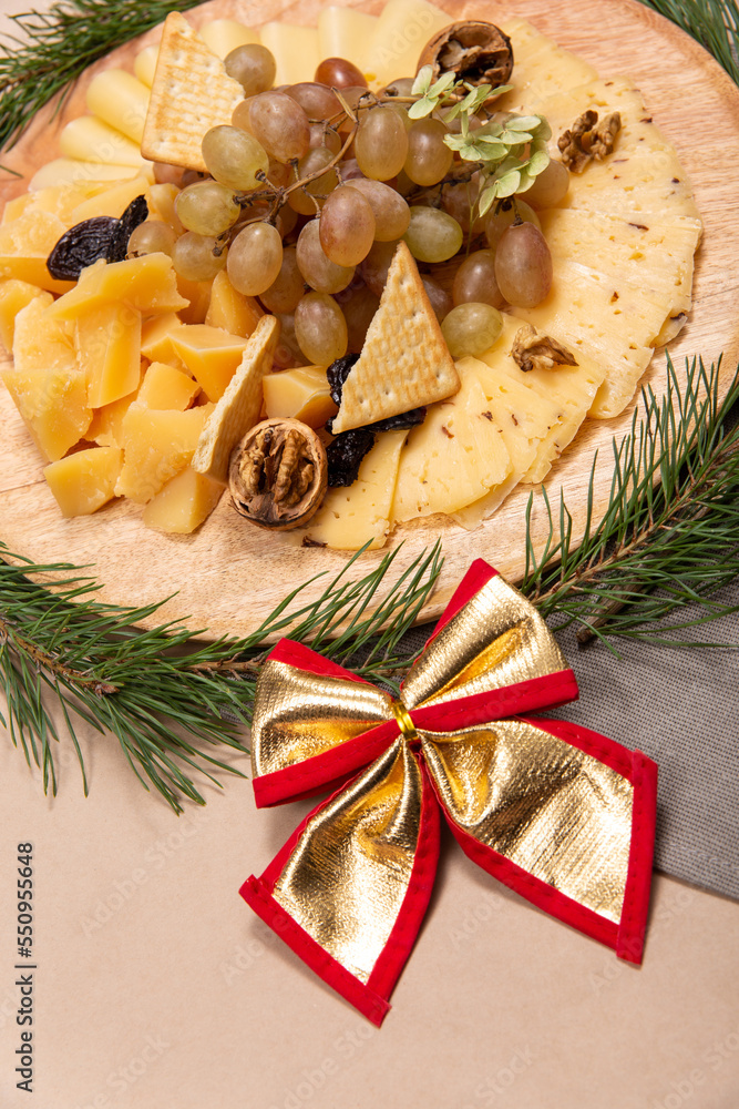 Christmas snacks on rustic wooden board Christmas snacks on rustic wooden board
