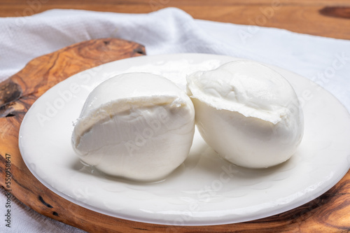 White ball of Italian soft cheese Mozzarella di Bufala Campana