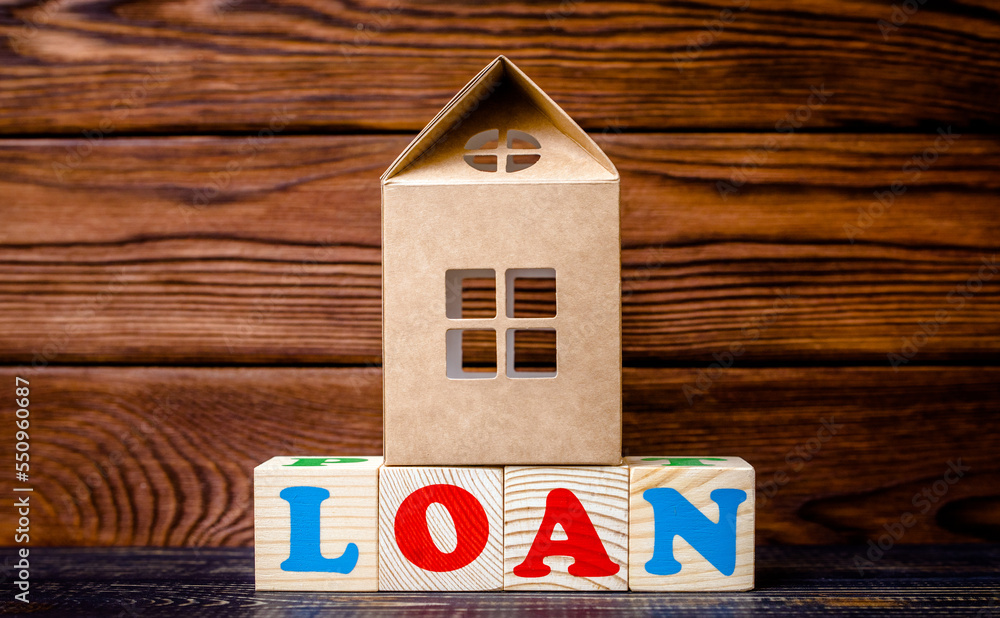 Wooden home and text on the cubes loan
Wooden home and text on the cubes loan