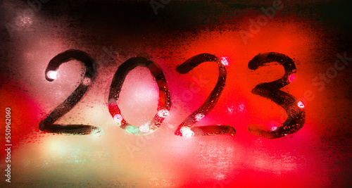 New year background of misted glass. 2023 numbers photo