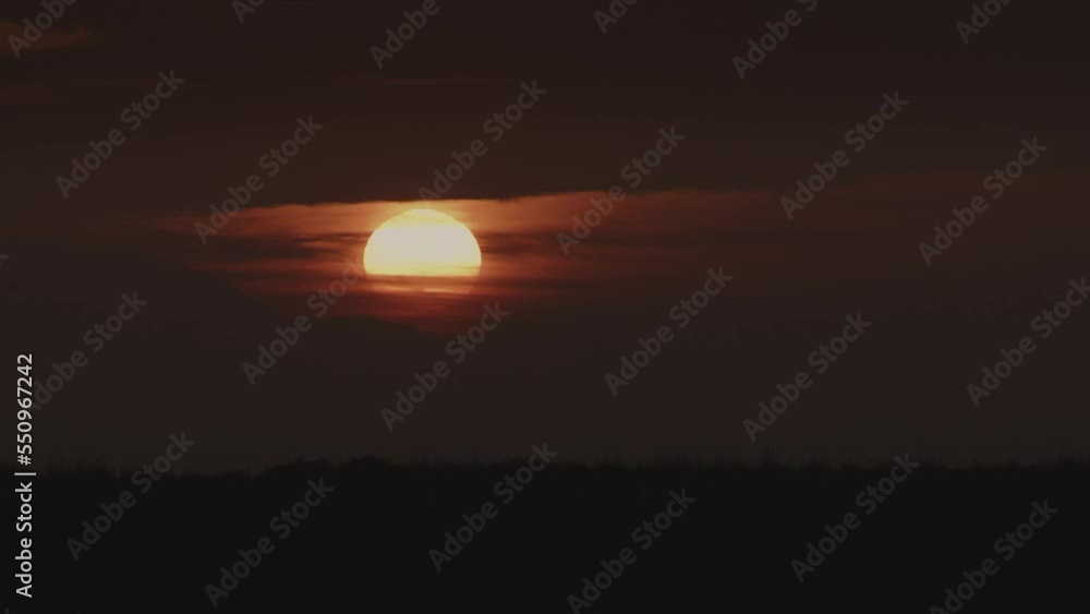 Time lapse of setting sun and clouds in dramatic sky / Coupeville, Washington, United States Time lapse of setting sun and clouds in dramatic sky / Coupeville, Washington, United States