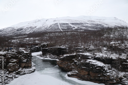 mountain river in winter in Abisko in Sweden