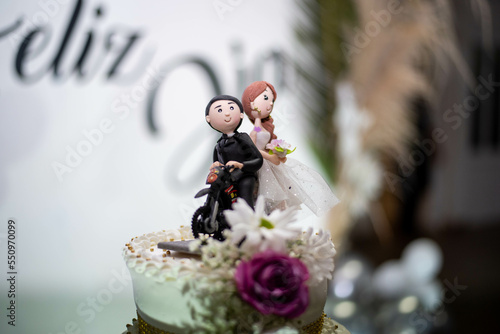 bride and groom with wedding cake