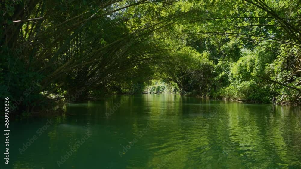Rafting. Martha Brae Rafting Village. Martha Brae River. Rafting on the Martha Brae. Montego Bay, Jamaica. Wooden bamboo raft. Rafting. Martha Brae Rafting Village. Martha Brae River. Rafting on the Martha Brae. Montego Bay, Jamaica. Wooden bamboo raft.
