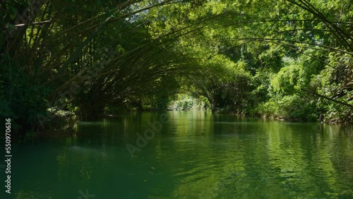 Rafting. Martha Brae Rafting Village. Martha Brae River. Rafting on the Martha Brae. Montego Bay, Jamaica. Wooden bamboo raft.