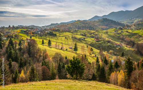 Fototapeta Naklejka Na Ścianę i Meble -  Beautiful landscape with Carpathian Mountains in Brasov county Romania captured in autumn 