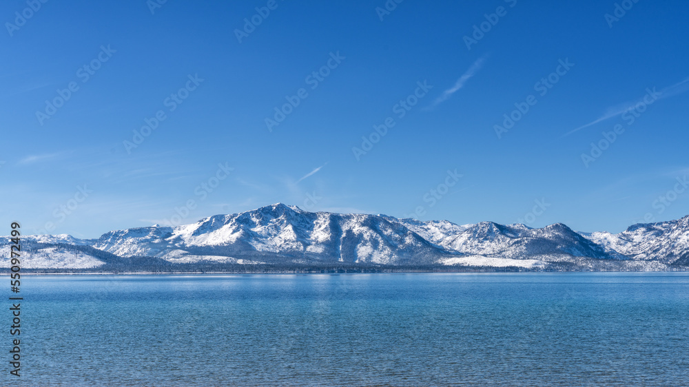 Snow Covered Peaks of Desolation Wilderness and  Lake Tahoe from Nevada Beach
