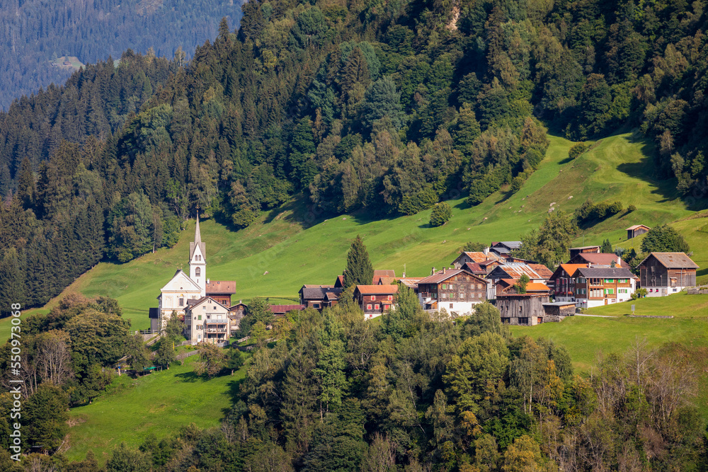 Idyllic landscape of village in Engadine valley, Swiss Alps, Switzerland