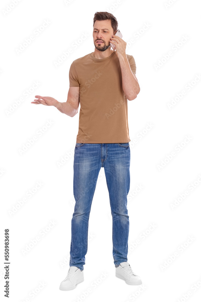 Man talking on phone against white background Man talking on phone against white background
