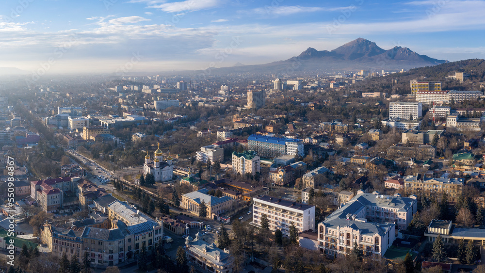 Panoramic aerial view of the town and Mount Bestau on sunny winter day. Pyatigorsk, Stavropol Krai, Russia.