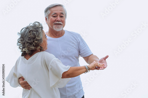 Obraz na płótnie Happy asian senior retired couple, relax smiling elder man and woman enjoying with retired vacation at sea beach outdoor. Health care, Family outdoor lifestyle w salonie