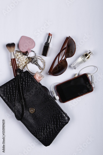 Woman's purse with contents spilling out