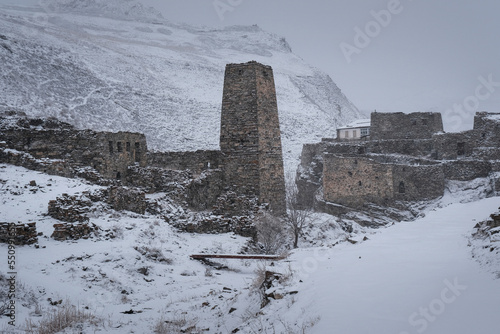 Galiat village at winter snowfall. Mountain Digoria, North Ossetia, Russia. photo