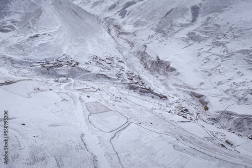 Birds eye view of Dunta village after winter snowfall. Mountain Digoria, North Ossetia, Russia.