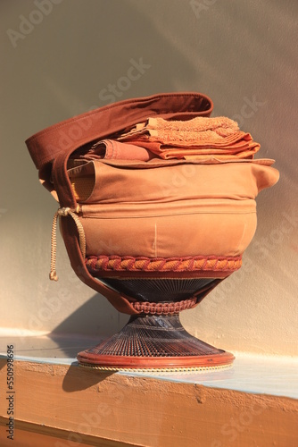 Monk's alms bowl: Put it on the table to offer food to monks at the funeral according to Thai tradition