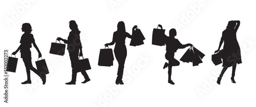 Collection of Young woman carrying shopping bag. Vector silhouette.