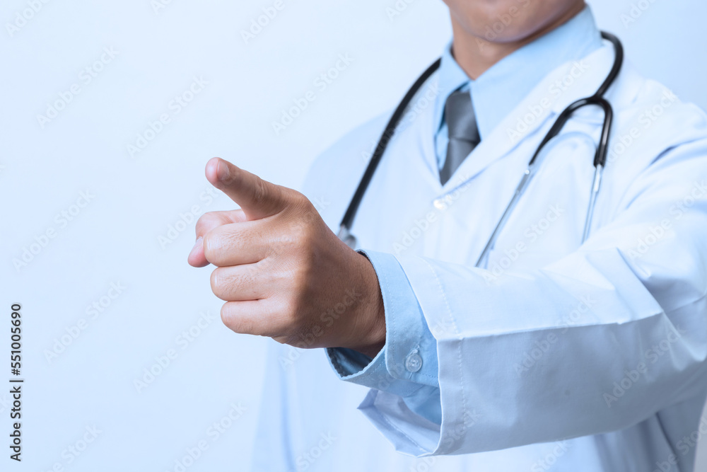 Doctor, medical professional pointing something in empty hand Doctor, medical professional pointing something in empty hand