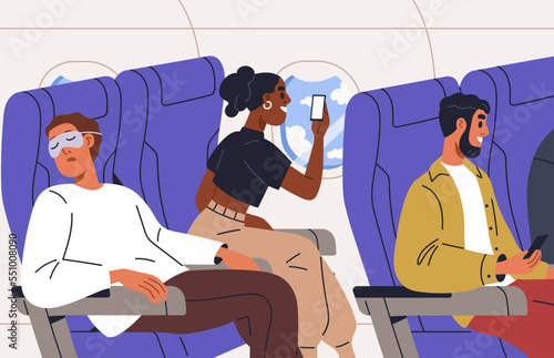 Happy passenger in air plane taking photo with mobile phone. Excited woman to...