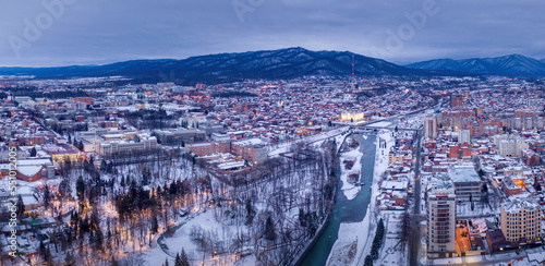 Panoramic aerial view of Vladikavkaz on cloudy winter morning. North Ossetia, Russia.