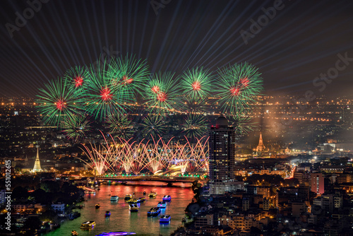 Beautiful fireworks and iconic Bangkok landmarks are illuminated by light displays and projection mapping during the Vijit Chao Phraya festival. photo