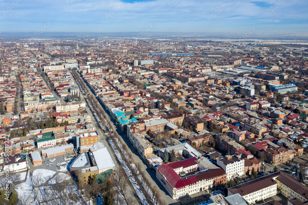 Aerial view of Prospect Mira and National Museum of Alania complex on sunny winter day. Vladikavkaz, North Ossetia, Russia.