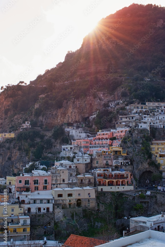 Beautiful sunset above the houses of famous  Positano town - Amalfi coast, Campania, South Italy