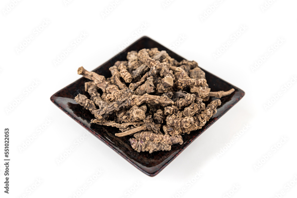 Valerian roots in a black ceramic tray diagonal view Valerian roots in a black ceramic tray diagonal view