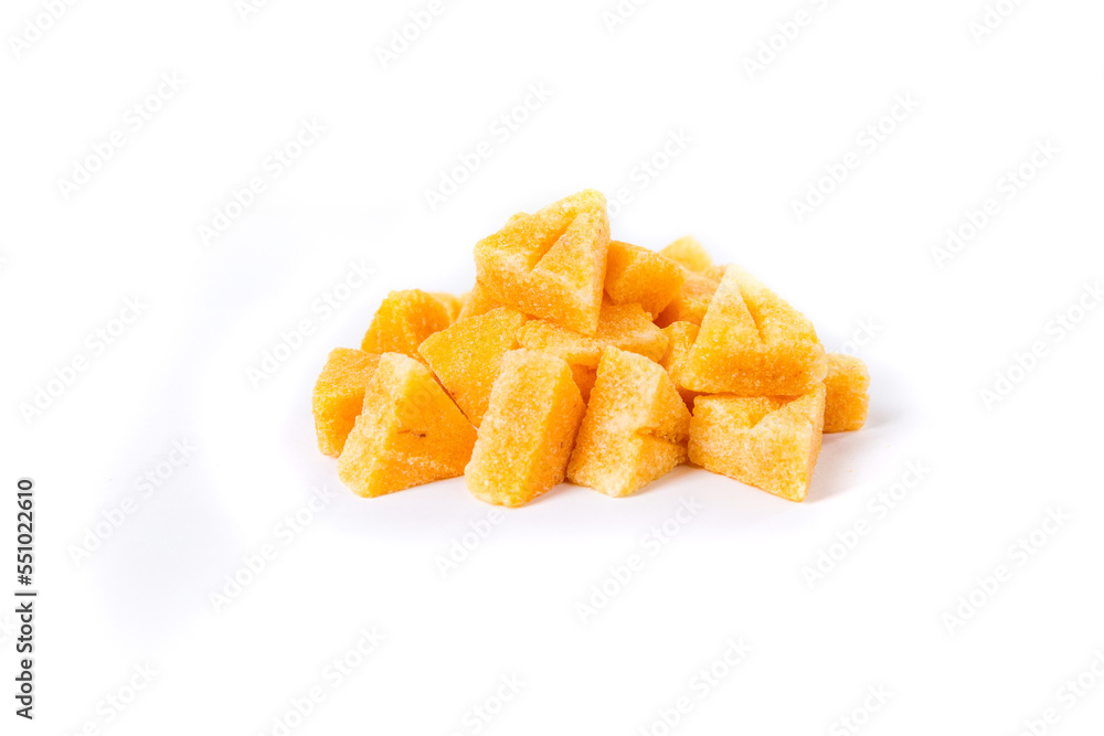 Saffron spiced sugar cubes in a pile isolated over white Saffron spiced sugar cubes in a pile isolated over white