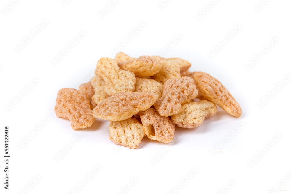 Cuttlefish snack crisps in a pile isolated over white Cuttlefish snack crisps in a pile isolated over white