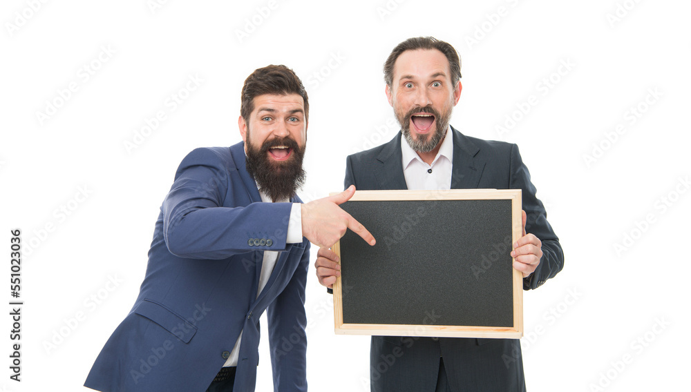 Wow that looks inviting. Surprised businessmen point finger at blackboard. Surprised and impressed teachers. Private teaching and tutoring. Bearded men look surprised. Youll be surprised, copy space Wow that looks inviting. Surprised businessmen point finger at blackboard. Surprised and impressed teachers. Private teaching and tutoring. Bearded men look surprised. Youll be surprised, copy space
