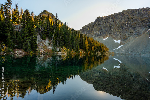 Fototapeta Naklejka Na Ścianę i Meble -  Landscape of Autumn Lake Reflection before Sunrise