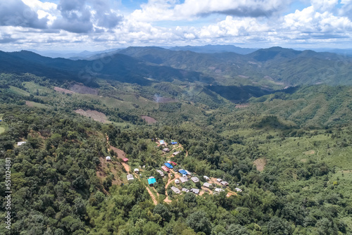 High angle view of a northern rural village in the valley Ban Thung Ton Ngio,  Mae Tuen, Omkoi district, Chiang Mai, Thailand. photo