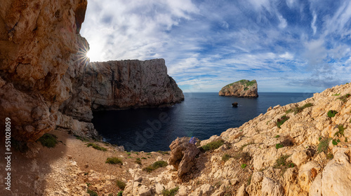 Panoramic View of Rocky Coast with Cliffs on the Mediterranean Sea. Regional Natural Park of Porto Conte, Sardinia, Italy. Nature Background.