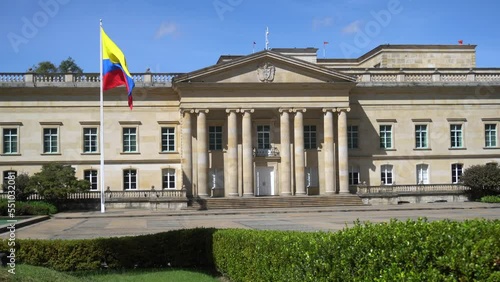 South America, Colombia Bogota 2022 - Bolivar square in downtown of the city - flag in the seat of the Colombian parliament politic and the residence of the president of the republic in Plaza de Núñez photo