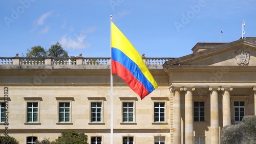 Obraz na płótnie South America, Colombia Bogota 2022 - Bolivar square in downtown of the city - flag in the seat of the Colombian parliament politic and the residence of the president of the republic in Plaza de Núñez w salonie