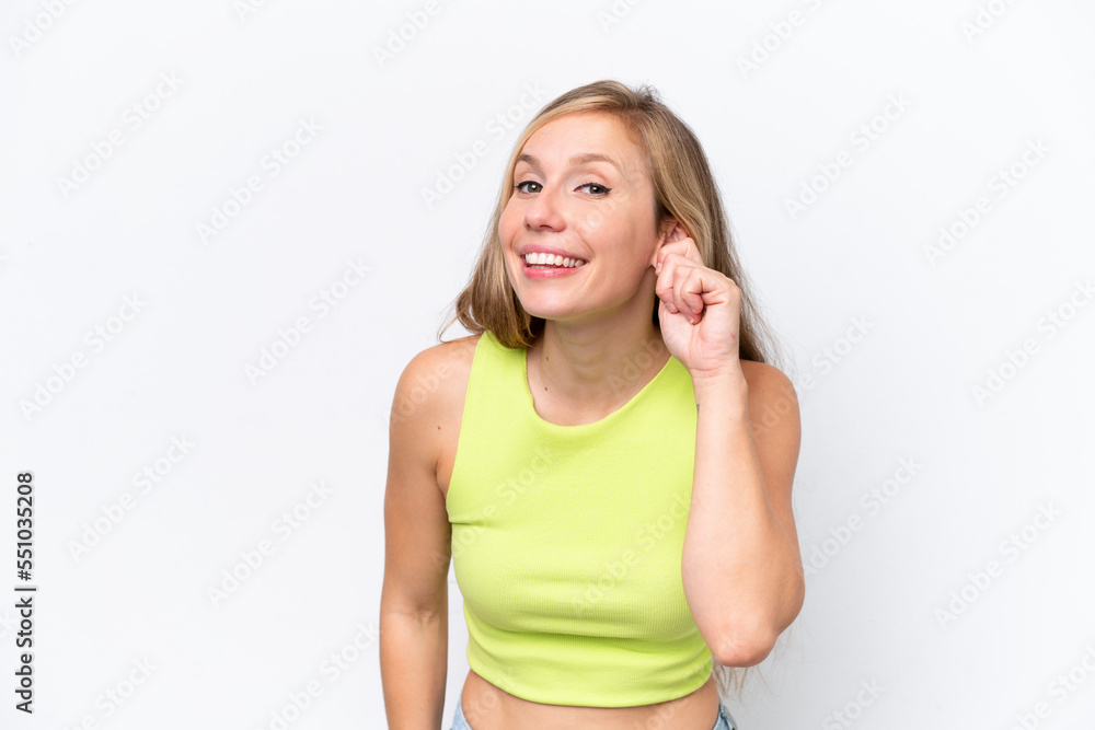 Young caucasian woman isolated on white background laughing