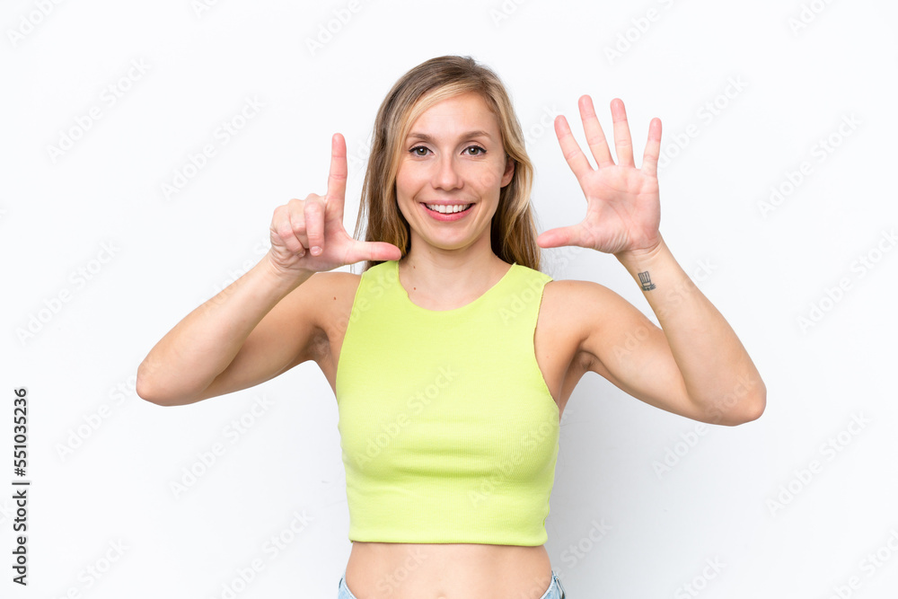 Young caucasian woman isolated on white background counting seven with fingers Young caucasian woman isolated on white background counting seven with fingers