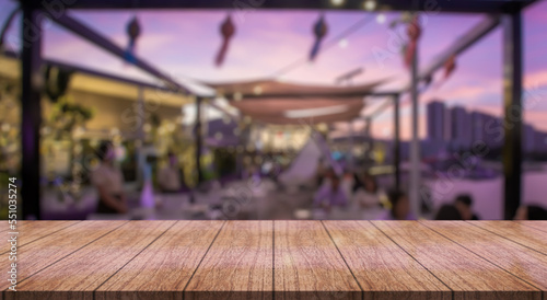 Wallpaper Mural Empty wooden table top with lights bokeh on blur restaurant background. Torontodigital.ca