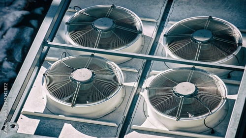 air conditioner heat pump white fans vent rooftop splitters rotating background