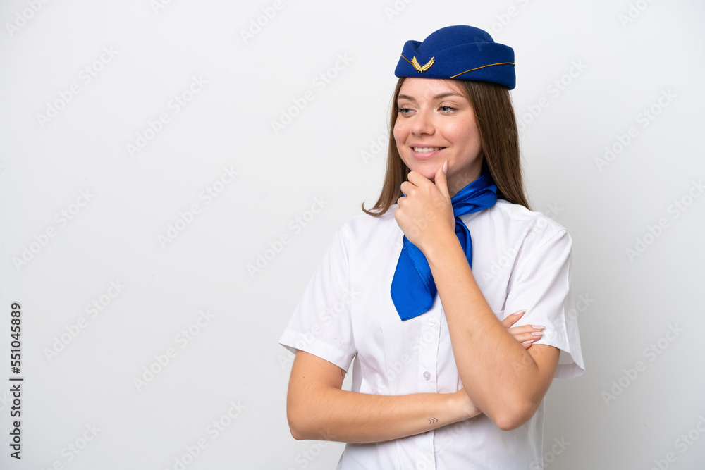 Airplane Lithuanian woman stewardess isolated on white background looking to the side Airplane Lithuanian woman stewardess isolated on white background looking to the side