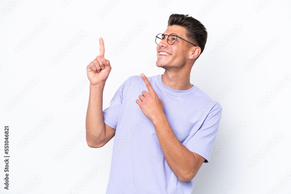 Young caucasian man isolated on white background pointing with the index finger a great idea Young caucasian man isolated on white background pointing with the index finger a great idea