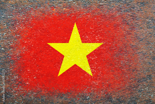 Flag of Vietnam. Flag painted on rusty surface. Rusty background. Copy space. Textured background